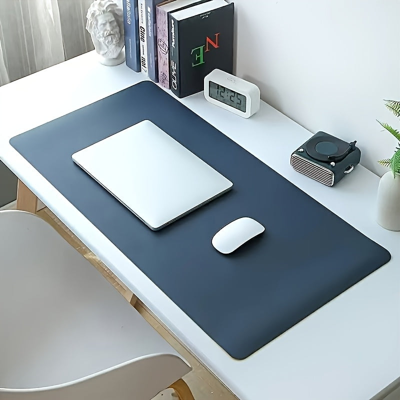 Black non-slip desk mat for office, ideal for computer and mouse.