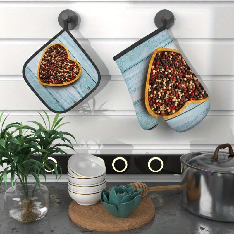 2 sets of heat resistant oven mitts and potholders with heart-shaped molds on a wooden board. Perfect for kitchen decoration, cooking, grilling, baking, and makes a great holiday gift. Suitable for use with peppercorns. Dimensions are 26.92 x 17.02 cm.