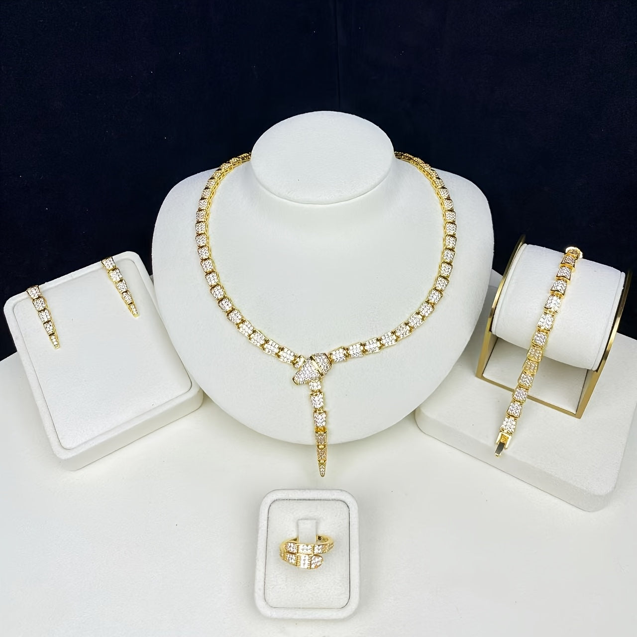 Stunning 18K Gold Plated Copper Jewelry Set featuring AAA Zirconia Stones, featuring a Seductive Snake Design Necklace and Ring. Suitable for both Everyday Wear and Special Occasions, an Ideal Gift for Women, especially during Ramadan.