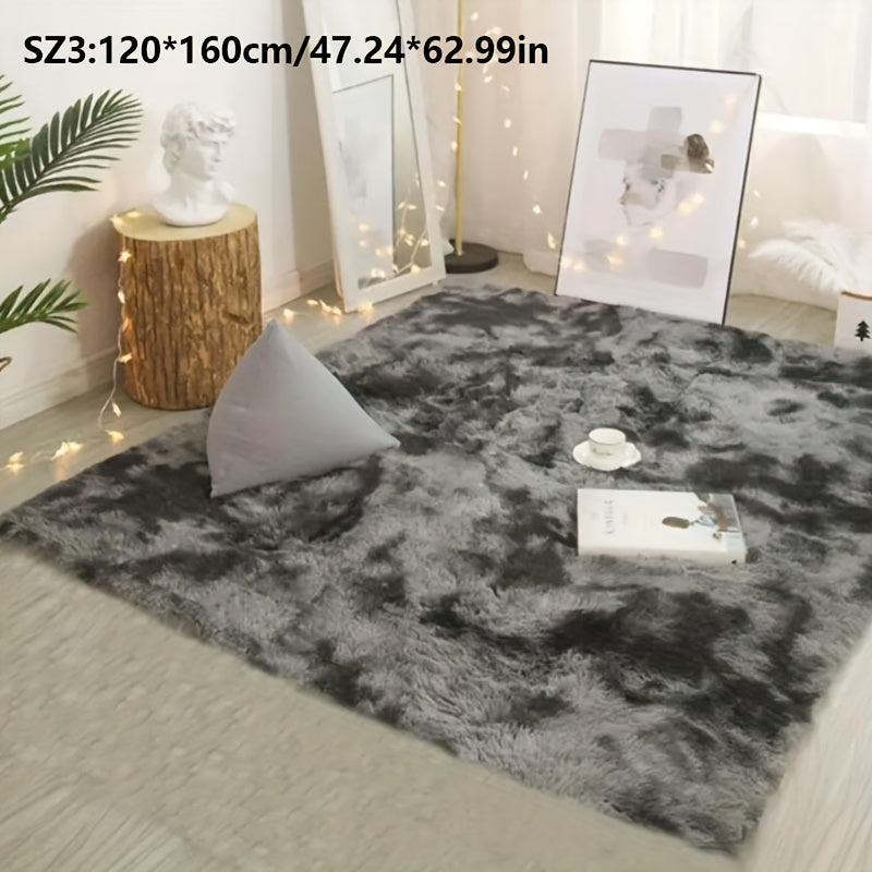 Long fleece carpet in a dark grey tie dye gradient, perfect for the living room coffee table or bedroom decor. This washable mat is fully padded and makes a great Halloween or Christmas gift.