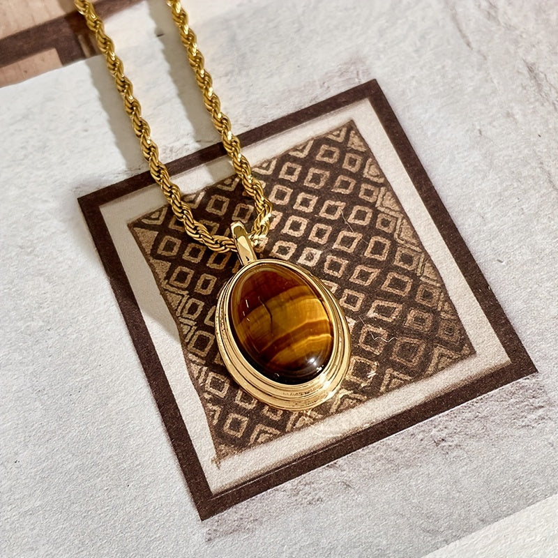 Stylish bohemian oval pendant necklace featuring Tiger Eye stone in a vintage design - Crafted from 18K gold plated titanium steel with a natural stone mosaic. Perfect for daily wear or as a special gift.