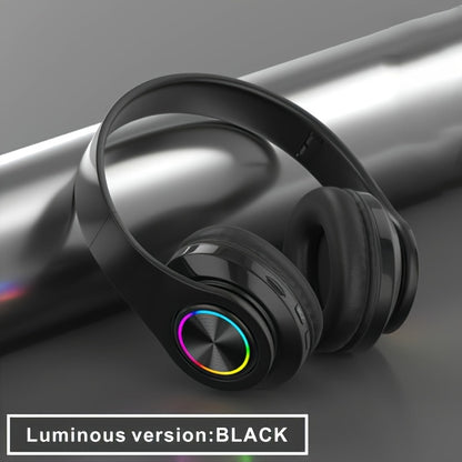 Wireless earphones with AUX port, foldable design for various uses, wireless connectivity and volume control.