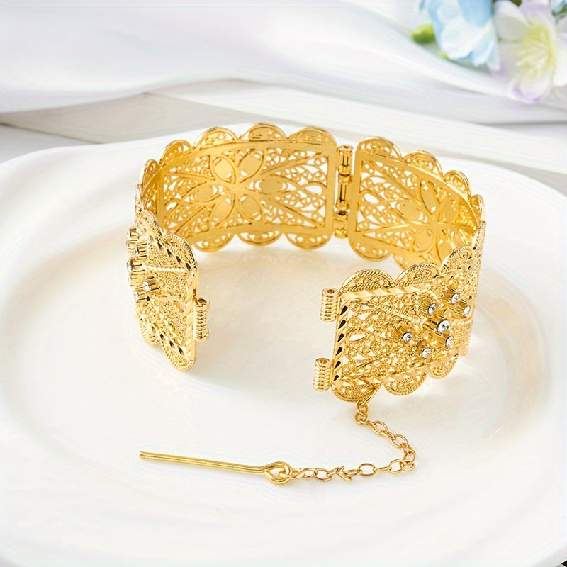 Exquisite Vintage-Inspired Bridal Bangle in Gold Plating with Intricate Hollow Carved Design and Sparkling Cubic Zirconia Details - Ideal for Weddings and Formal Events