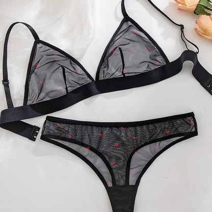 Sexy black sheer mesh lingerie set with red heart pattern, medium support, no underwire, drop waist, made of 90% polyester and 10% elastane.