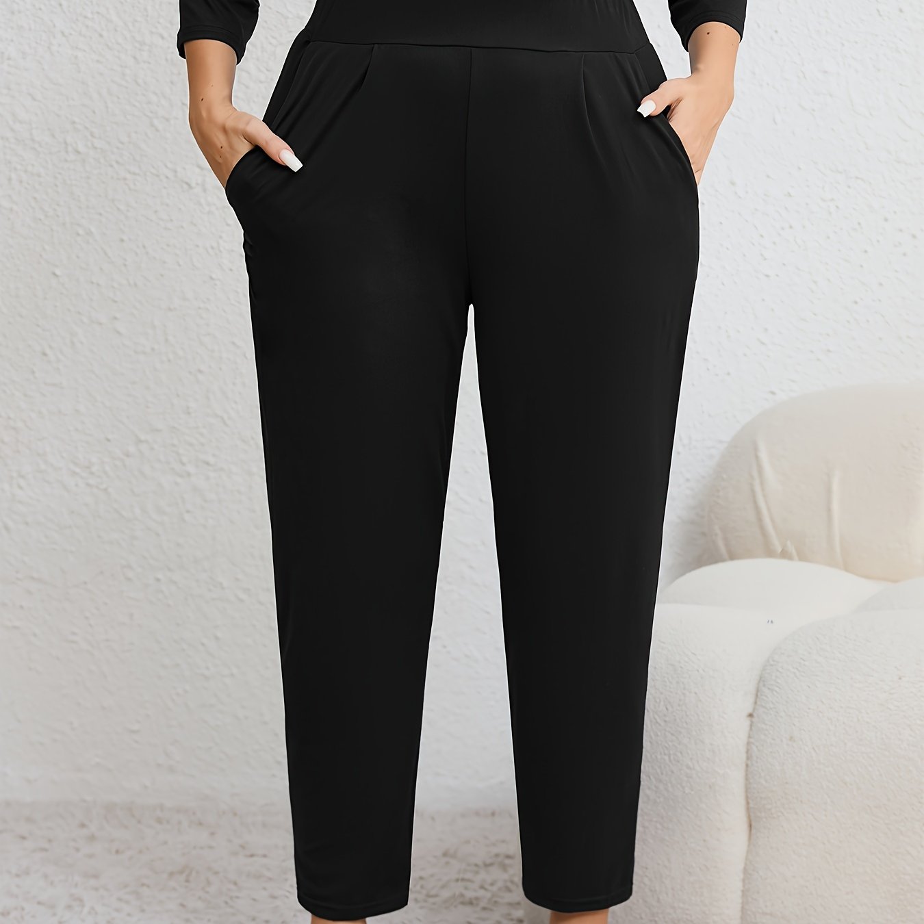 Plus size women's harem pants with high elasticity, ruched waist, pockets, and versatile for all seasons.