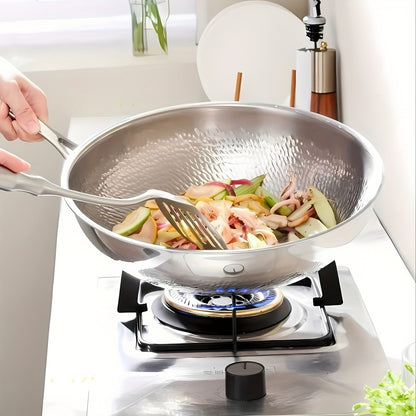 Pure Cook presents the 31.75/33.78cm Titanium-Coated Wok with Lid, featuring Hammered Tri-Ply Stainless Steel. This wok is free from PFOA and PTFE, making it safe for use in dishwashers and ovens.