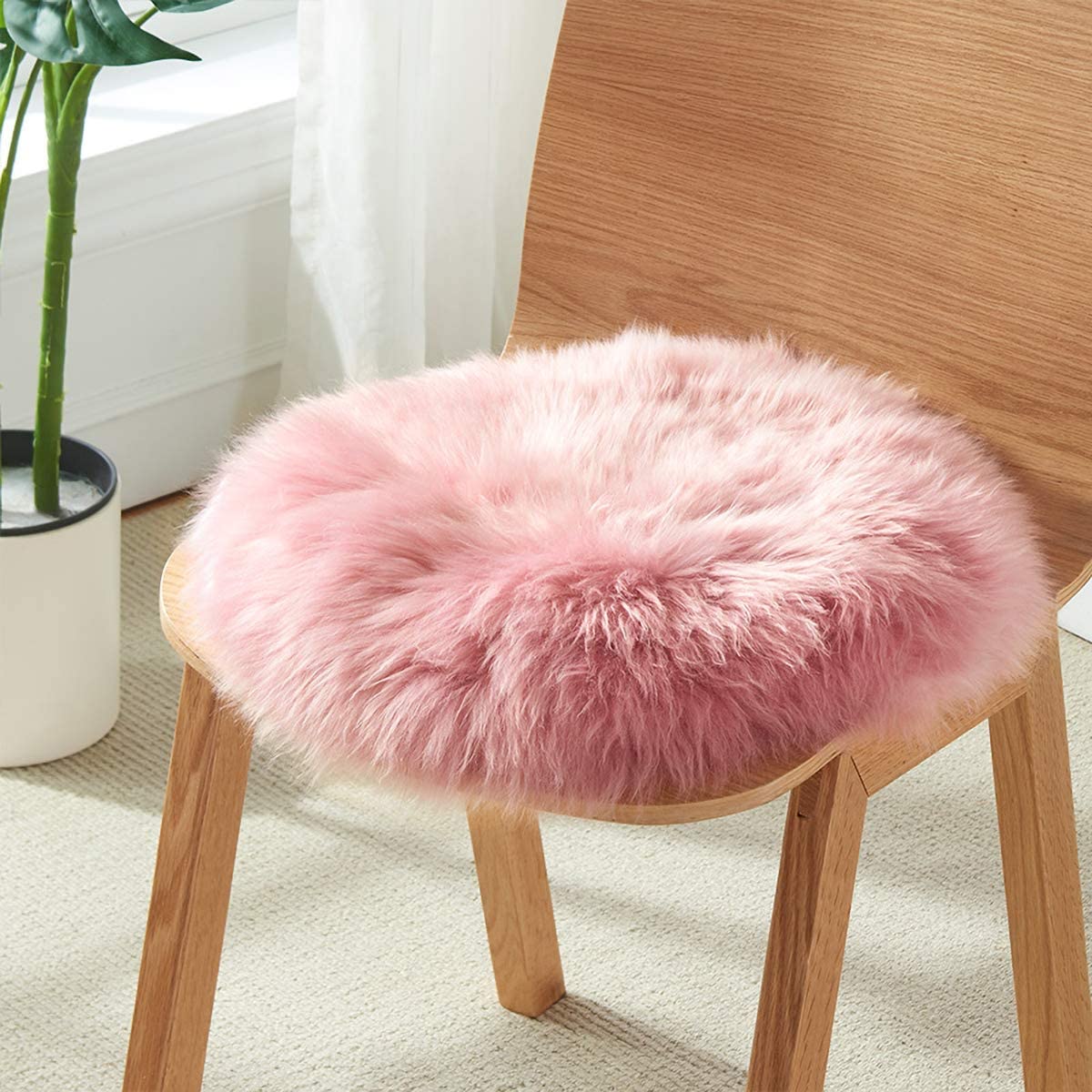 Soft and cozy faux fur chair cover, ideal for adding a touch of luxury to your living room or bedroom décor.