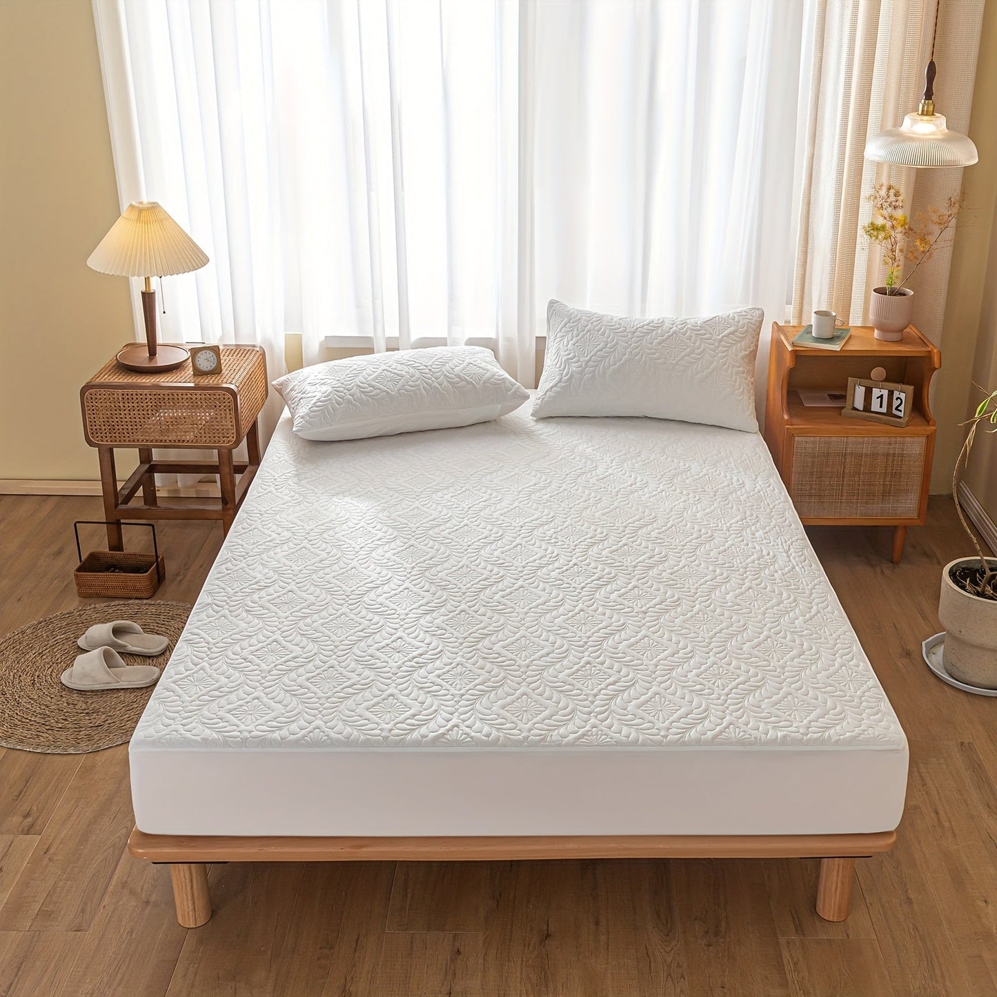 One set of two pieces of 100% waterproof mattress protector pillowcases made of 3D air bamboo fabric. The mattress cover is designed to provide cooling and is smooth, soft, and breathable. It is noiseless and washable, with a deep pocket size ranging