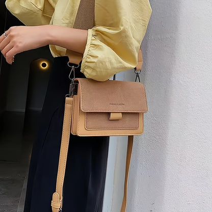 Elegant beige and brown crossbody bag with adjustable strap for everyday use, featuring a stylish geometric shape and magnetic closure.