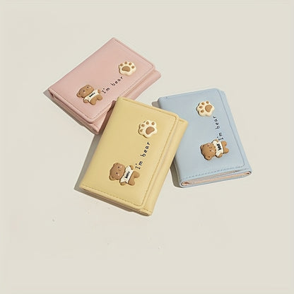 Chic compact folding wallet for women with cute cartoon design and slim faux leather card holder.