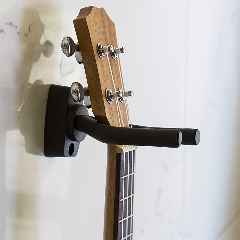 Guitar wall mount holder with adjustable soft hook for all types of guitars, ukuleles, bass, and erhus.