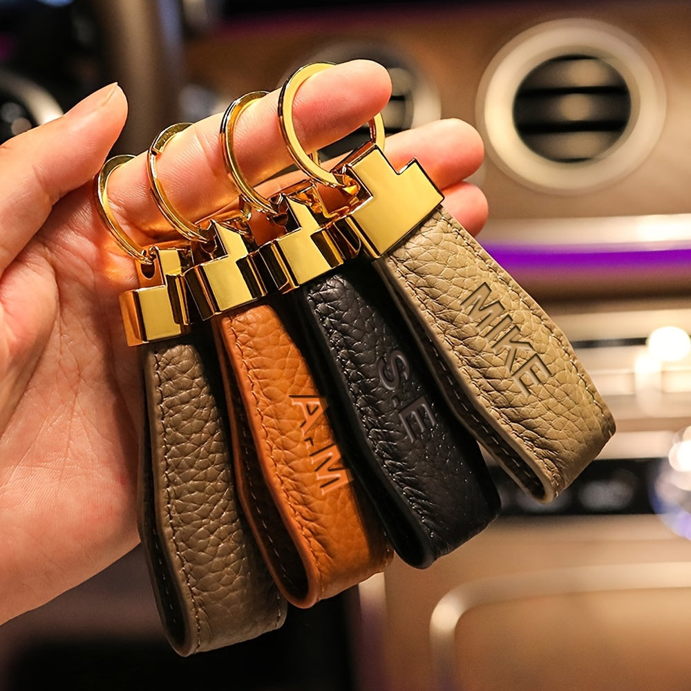 Get a custom engraved initial car key ring with climbing hook on this 1pc Personalized Microfiber Faux Leather Keychain. This unisex fashion accessory is perfect for both men and women and makes an ideal gift for Valentine's Day, Thanksgiving, Christmas