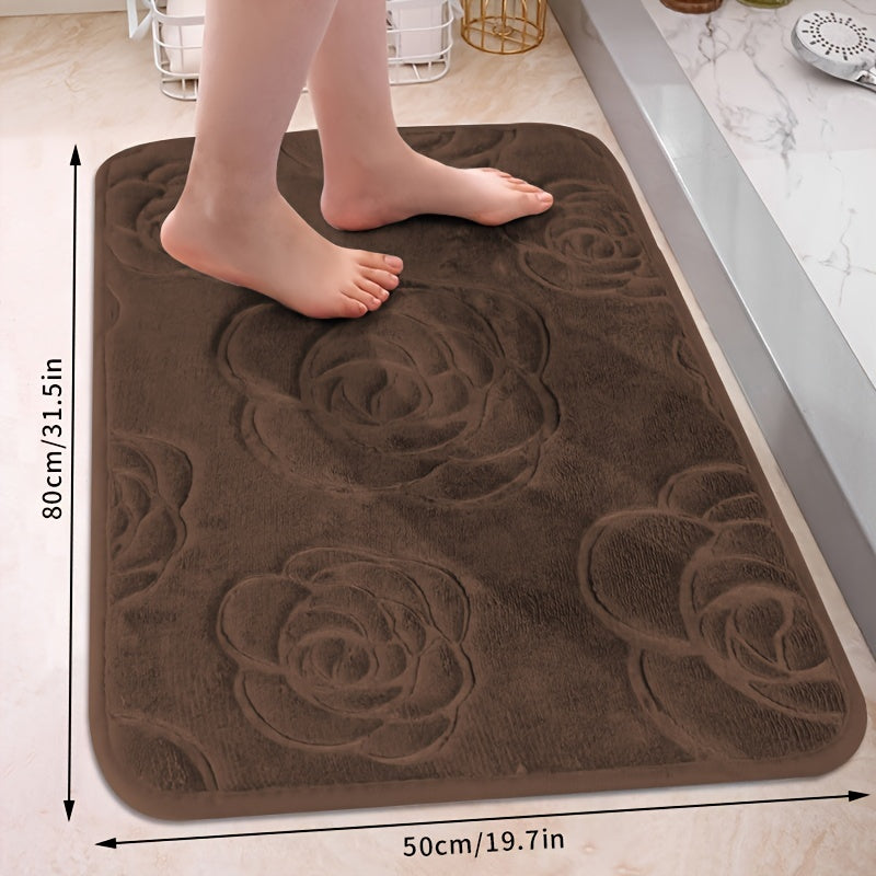 Soft and luxurious bath mat featuring a beautiful rose embossed design. This non-slip bathroom rug is made of ultra-soft knit polyester, providing superior comfort and absorbency. Lightweight and washable, this versatile mat is perfect for use in the