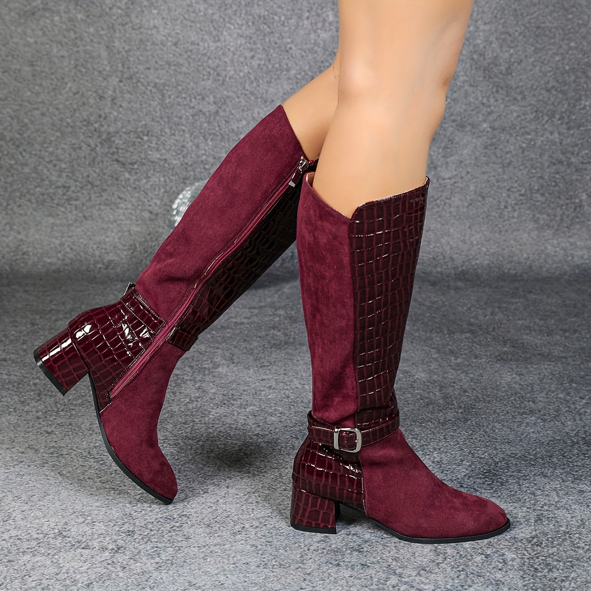 Wine red mid-heeled boots with pointed joints and side zippers, knee-high plush winter boots for a knightly look.