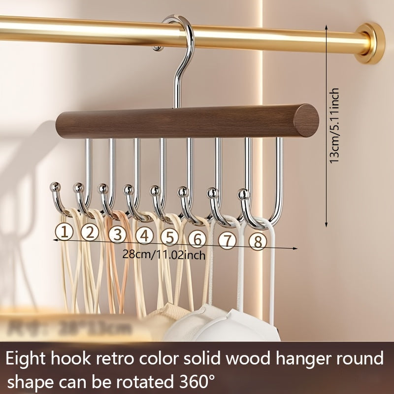 A versatile and sturdy wooden hanger with 8 hooks, designed for saving space and organizing wardrobes efficiently. This heavy-duty hanger can rotate 360 degrees and is perfect for storing vests, swimsuits, bras, scarves, hats, belts, and other household