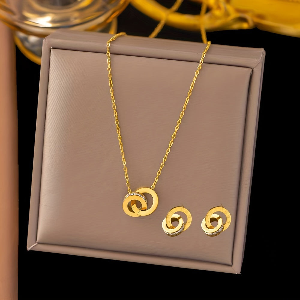 This elegant stainless steel necklace and earrings set features a stylish double-loop Roman numeral engraving. Perfect for daily wear, special occasions, or as a thoughtful gift for a lady. Set includes three pieces.