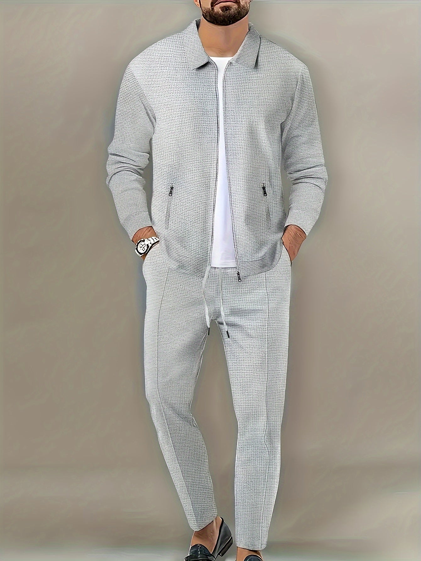 Men's 2-piece outdoor outfit: Solid long sleeve zip-up jacket with zipper pockets and pants.