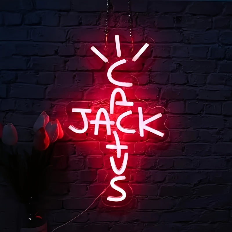 Cactus Jack Red Neon Sign is a USB-powered wall hanging light with a push button control. It is a versatile decor piece for bedrooms, home bars, pubs, parties, and is inspired by West Coast rap culture.