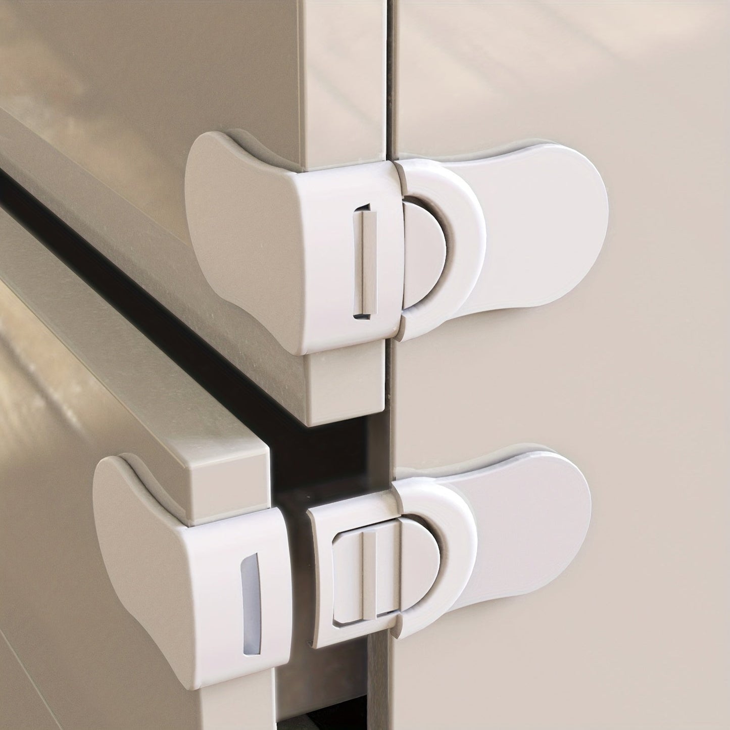 Check out the Looktosee 5-Pack Safety Cabinet Locks! Made with ABS material, these locks are phthalate-free and easy to install without any drilling. The strong adhesive makes them perfect for use on drawers, cabinets, and even the fridge. Keep your