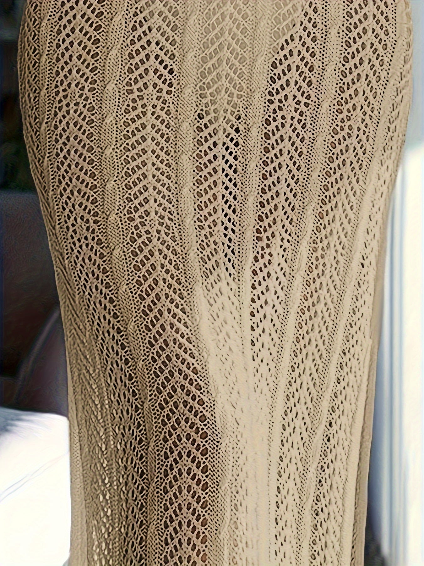 Elegant knit beach cover-up dress with sexy halter neck, deep V-cut, sheer hollow design, stretch fabric, and machine washable.