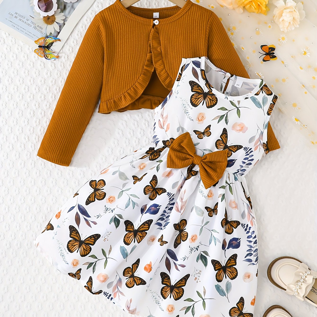 Girls casual dress with butterfly print, paired with a solid color long-sleeved jacket for an outdoor outfit.