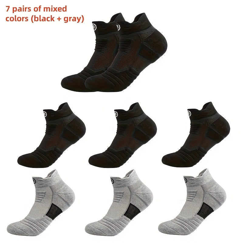 5 pairs of high-performance athletic compression socks for men in gray, black, and white. Made with breathable polyester and sweat-wicking material with a towel bottom, featuring a