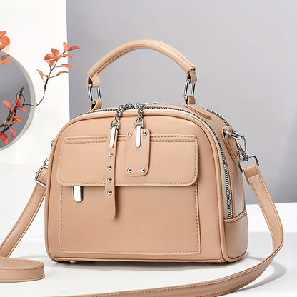 Women's casual shoulder bag made of PU material with zipper closure, polyester lining, oil-coated finish. Simple and versatile design.