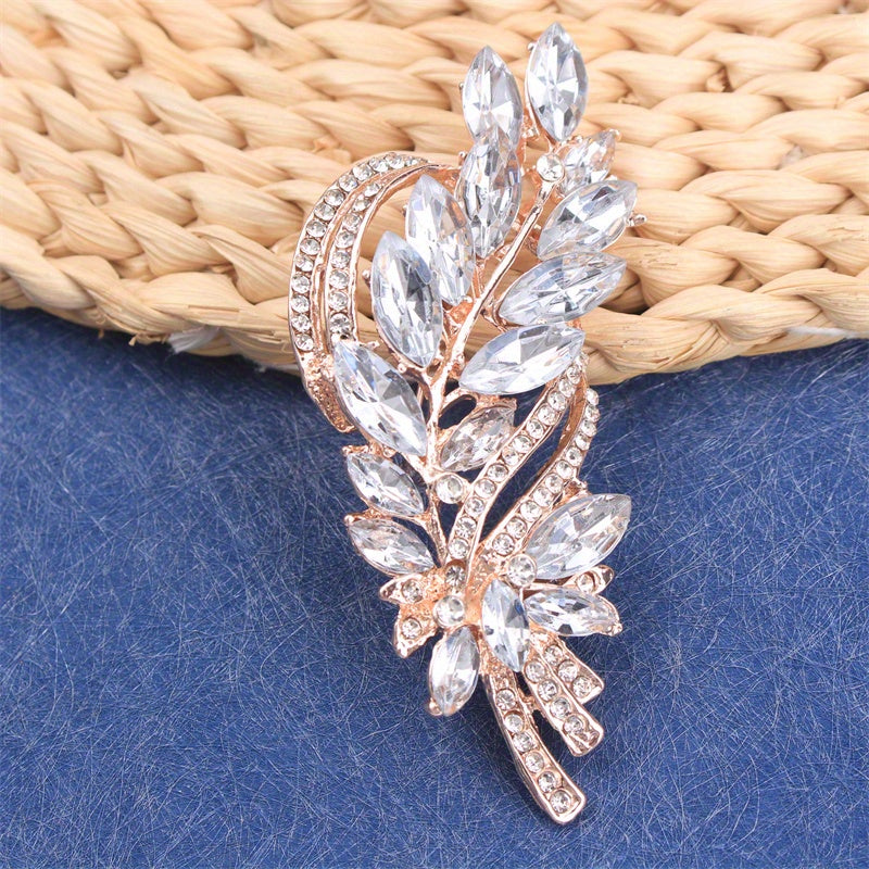 Elegant and luxurious rhinestone flower brooch, featuring an irregular faux floral design. This versatile accessory can be worn on clothing, bags, hats, and as women's fashion jewelry.