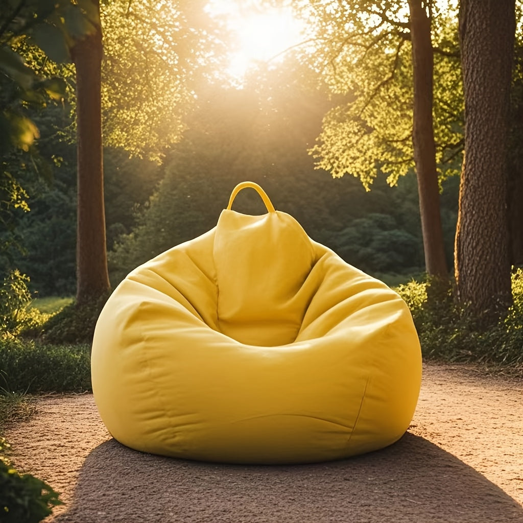 A soft and cozy bean bag chair, perfect for lounging in a reading nook or taking with you on camping trips. This portable lazy sofa features a space-saving design and can be used for multiple purposes. The machine-washable one-piece fabric construction