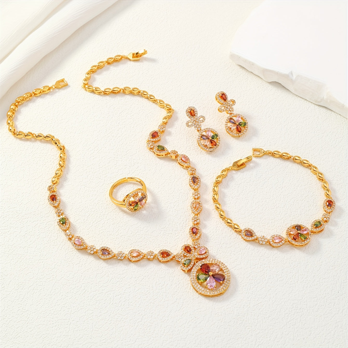 Elegant Women's 4-Piece Jewelry Set with Vintage Luxury Vibe - Featuring 24K Gold Plated Copper and Synthetic Zirconia Stones in a Timeless Circle Motif. Includes Necklace, Bracelet, Ring, and Earrings - Perfect for Weddings, Banquets, or as a Thoughtful