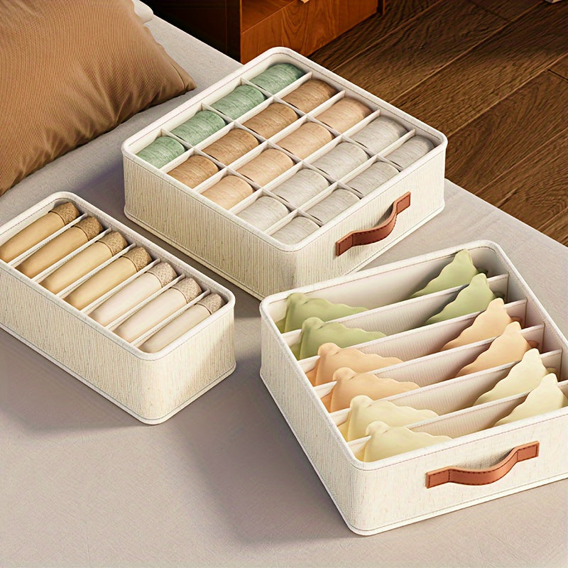 Beige foldable drawer organizer with rose gold handles for socks, underwear, and accessories. Ideal for contemporary closet organization.