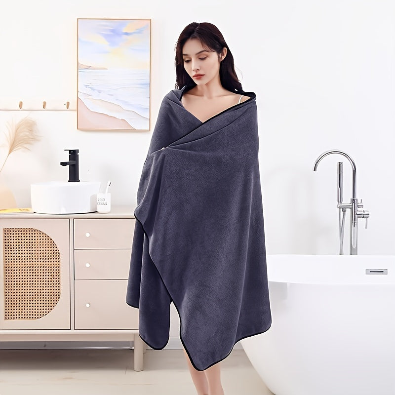 Large bath towel for the home bathroom, absorbs quickly and dries fast, soft and skin-friendly, ideal bathroom supply.