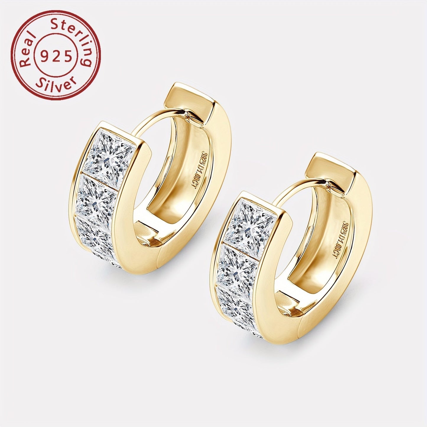 A set of elegant earrings featuring thick Moissanite stones set in 925 silver. These princess square cut earrings showcase an irregular design, creating a unique and eye-catching look. The pure silver earrings are lightweight at 5.5g and feature 8 pieces