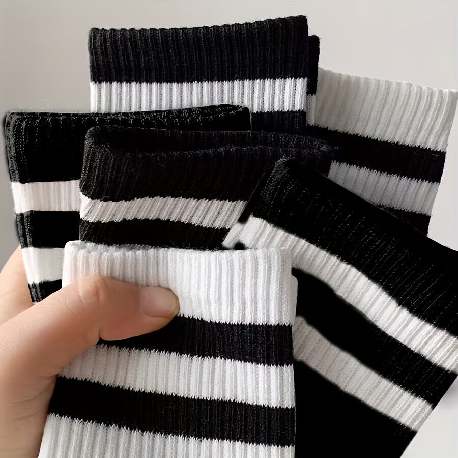 10 pairs of men's black and white long tube socks for autumn and winter, Japanese-style, absorbent, anti-odor, and versatile for sports.