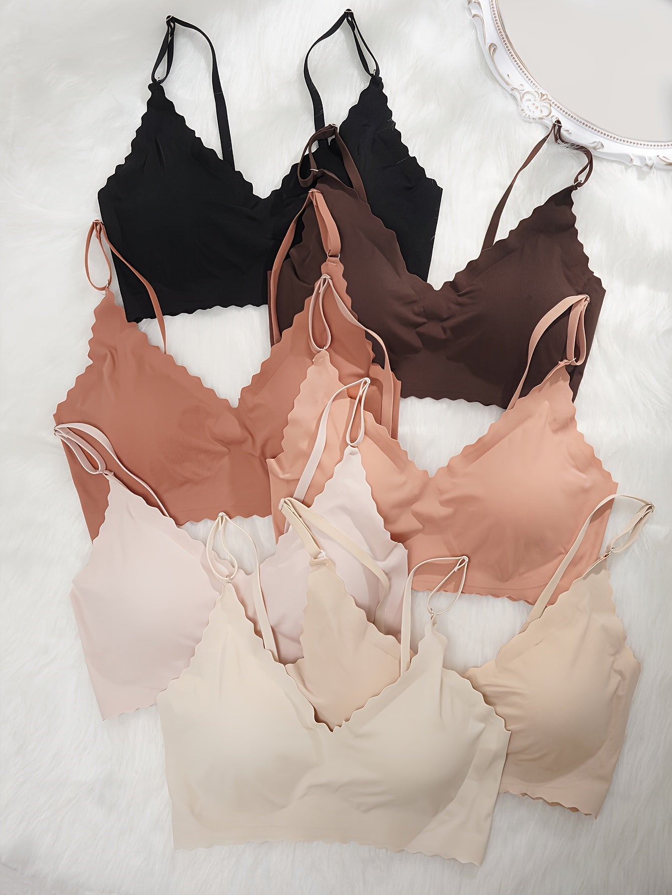 7-piece collection of solid push-up bras with removable pads for all-day comfort and support. Perfect for everyday wear.