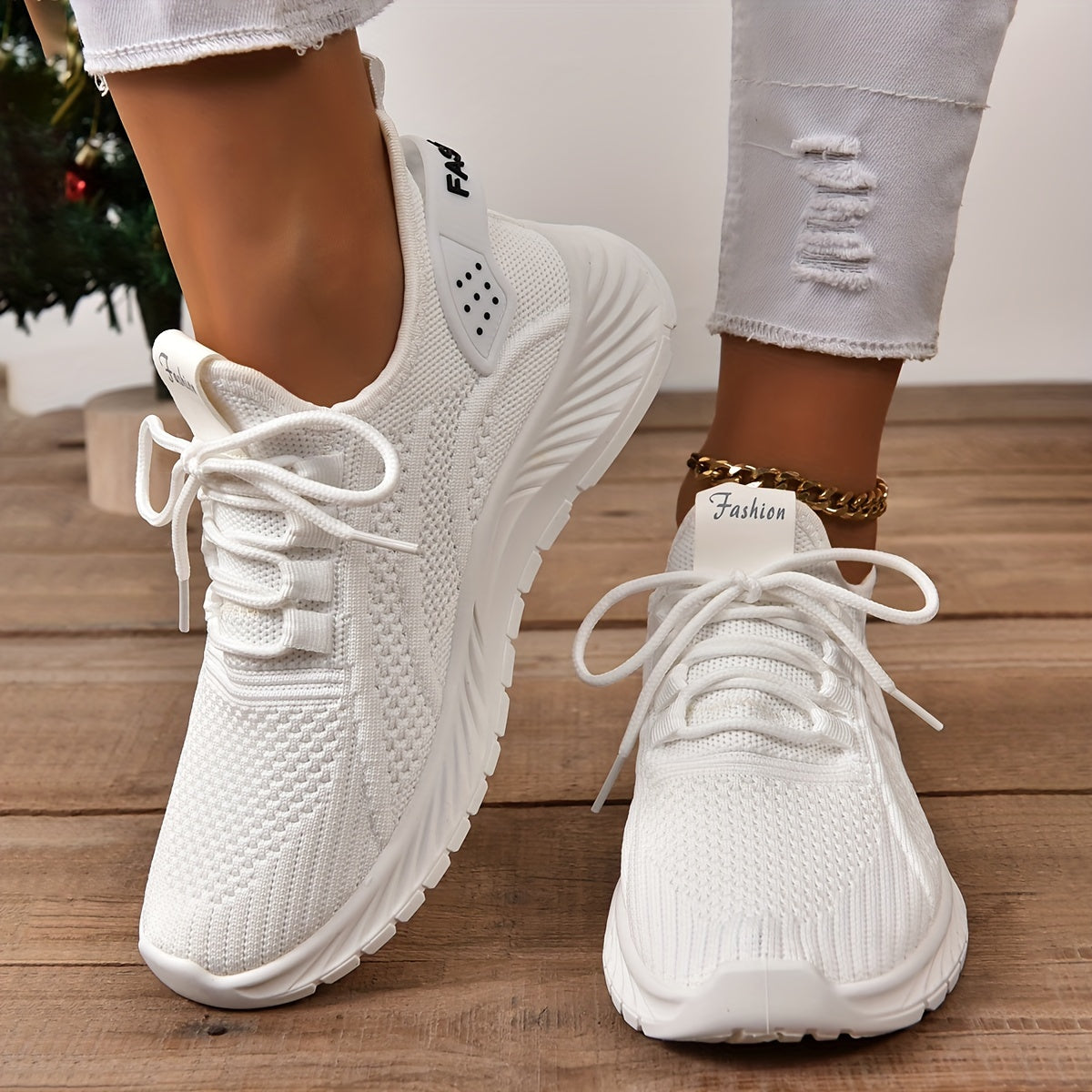 Trendy white knit fabric sneakers for women with EVA sole and breathable lace-up design, suitable for all seasons. Lightweight and stylish.