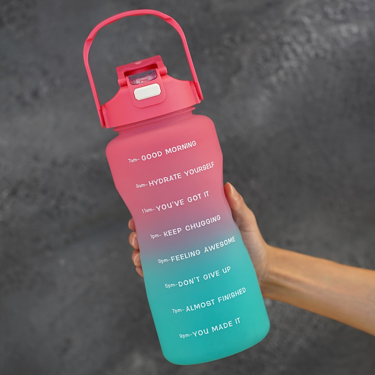 68oz gradient water bottle with motivational time markers, leak proof straw, ideal for running and sports, hand wash only, PVC free, great holiday gift option.