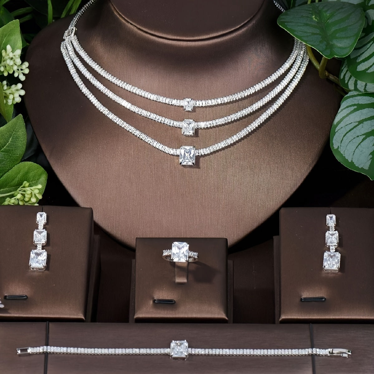 Luxurious Bridal Jewelry Set featuring Multi-Layer Sparkling Square Zirconia, 18k Gold Plating, and Necklace, Earrings, Ring, and Bracelet. Perfect for Women on their Wedding Day or Special Occasion.