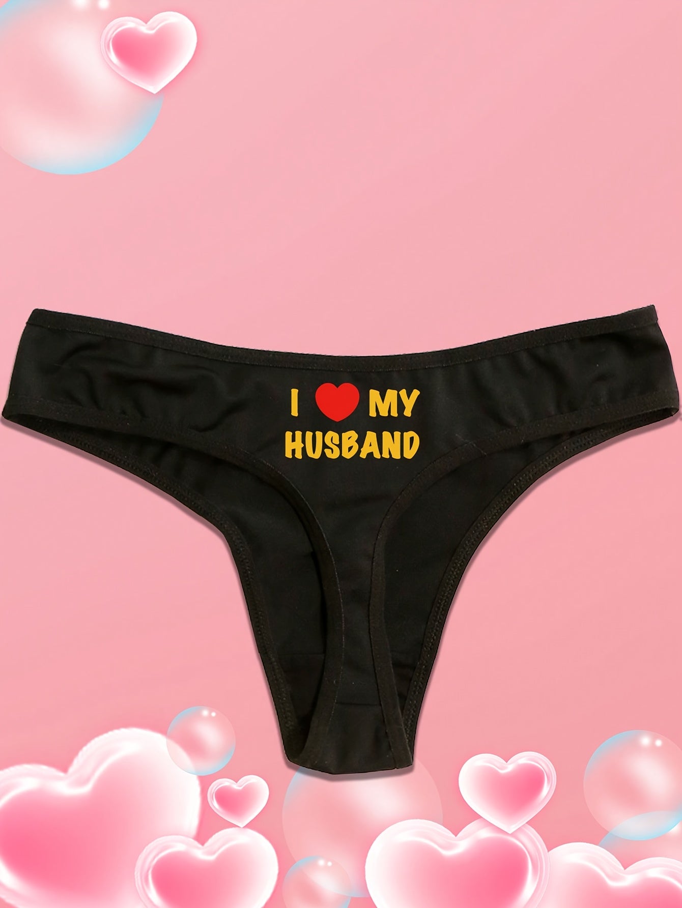 Novelty thong panties with "I Love My Husband" print for Valentine's Day and Father's Day. Sexy low-rise triangle underwear in polyester, casual style. Adult size, knit fabric, 1-pack.