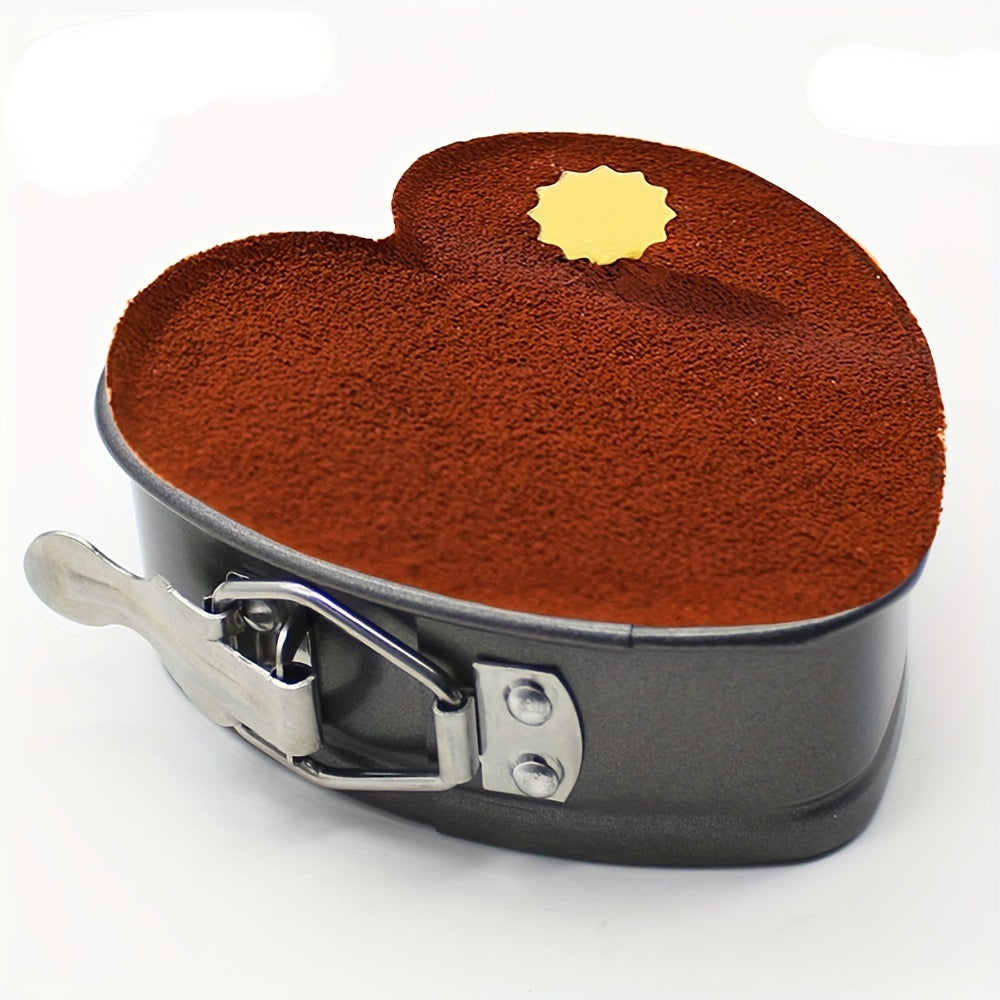 Heart-shaped detachable bottom baking pan, measuring 10.49cm, perfect for making cheesecakes, fried eggs, pudding molds, cake tiers, wedding cakes, and more. This nonstick springform pan features a removable bottom for easy release and is leakproof. It