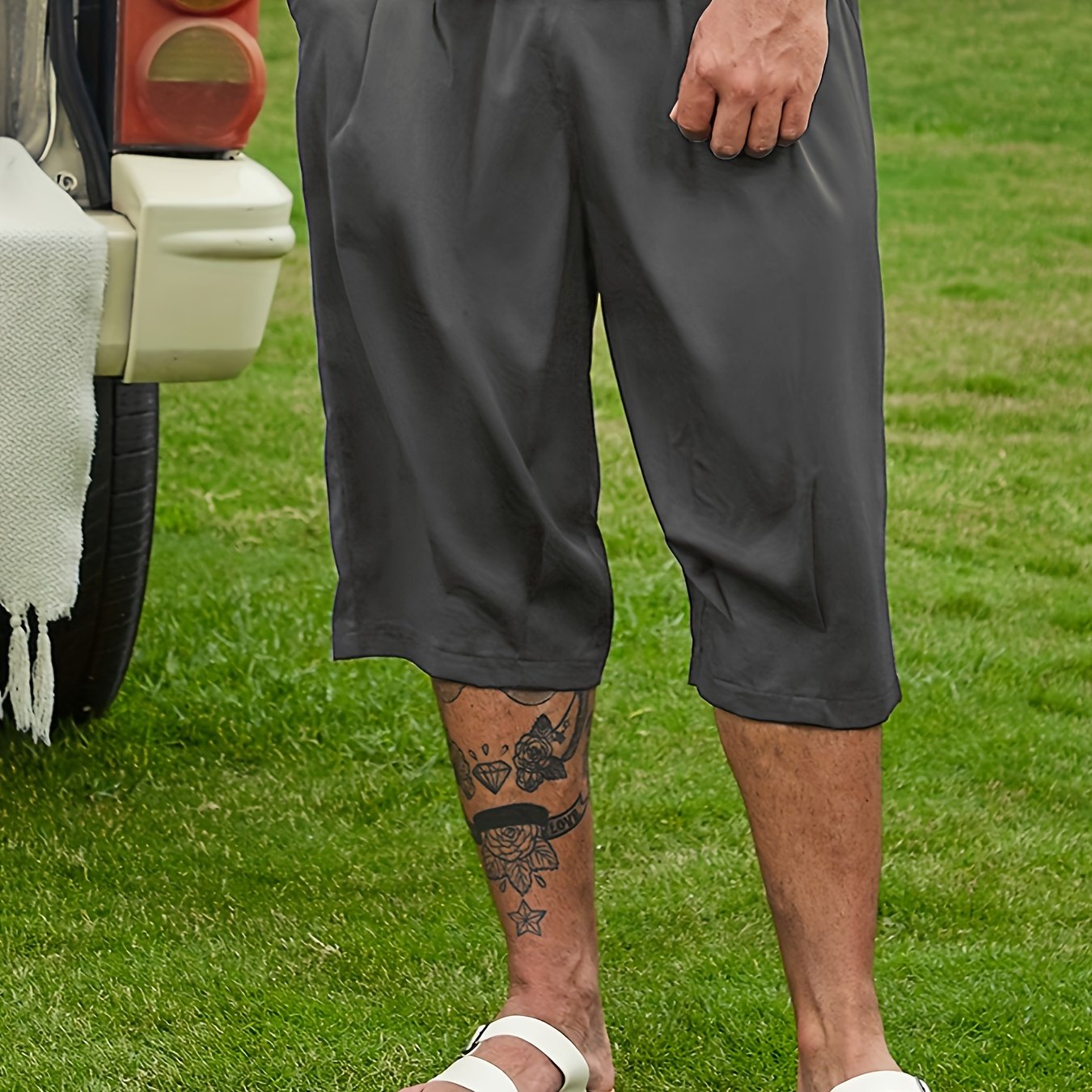 Breathable loose-fit solid capri pants for plus-size men, perfect for summer.