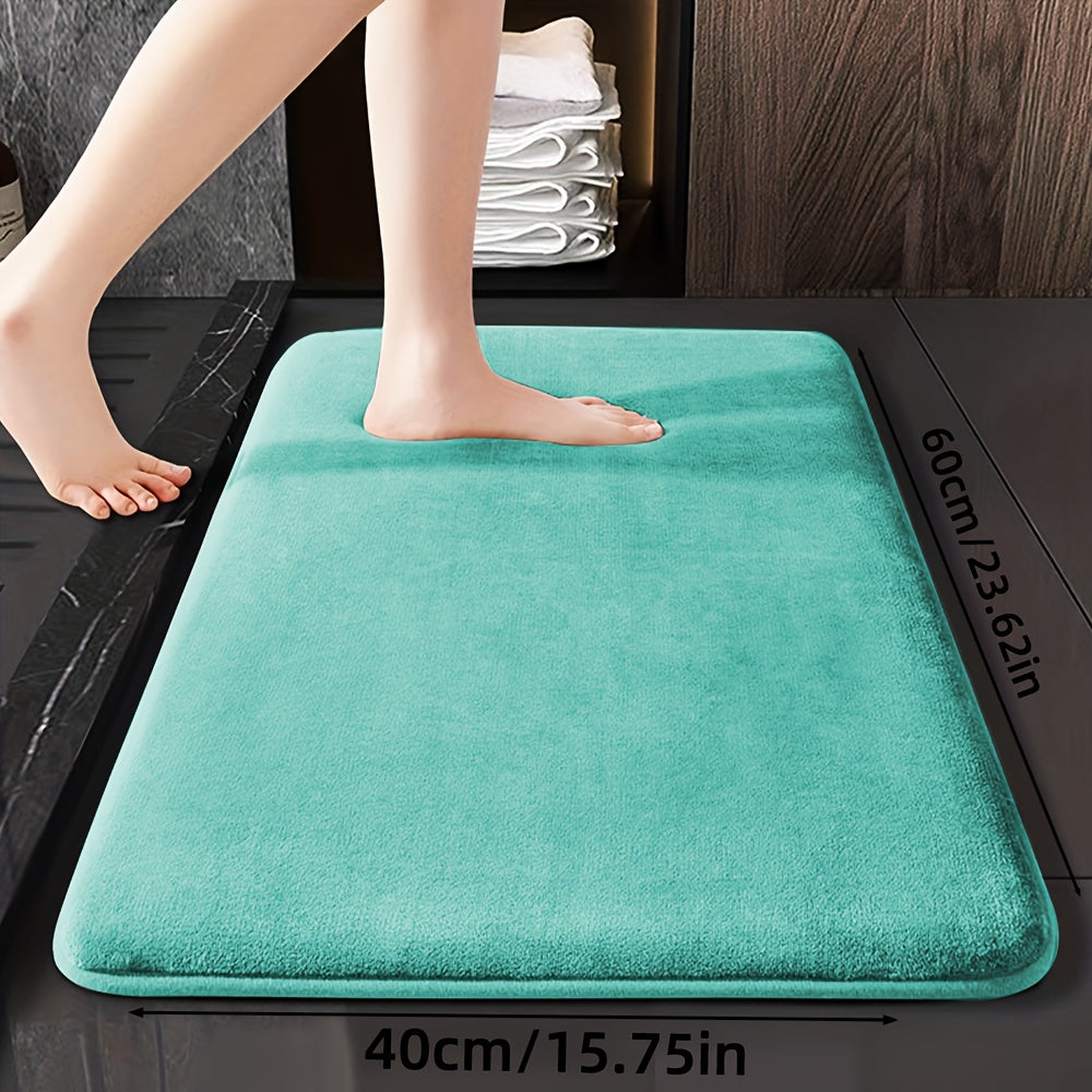 Soft and durable polyester bathroom mat with geometric design, ideal for shower, bathtub, bedroom, and living room. Versatile and non-slip, it is highly absorbent and machine washable.