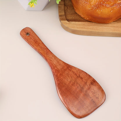 Eco-friendly wooden rice paddle and serving spoon for easy, healthy cooking.