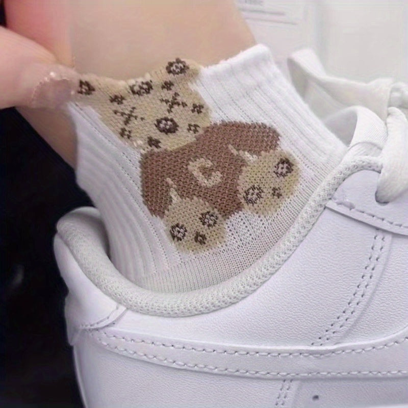 5 pairs of women's cute cartoon teddy bear short socks in coffee color. Made from breathable polyester blend and are comfortable. Machine washable.