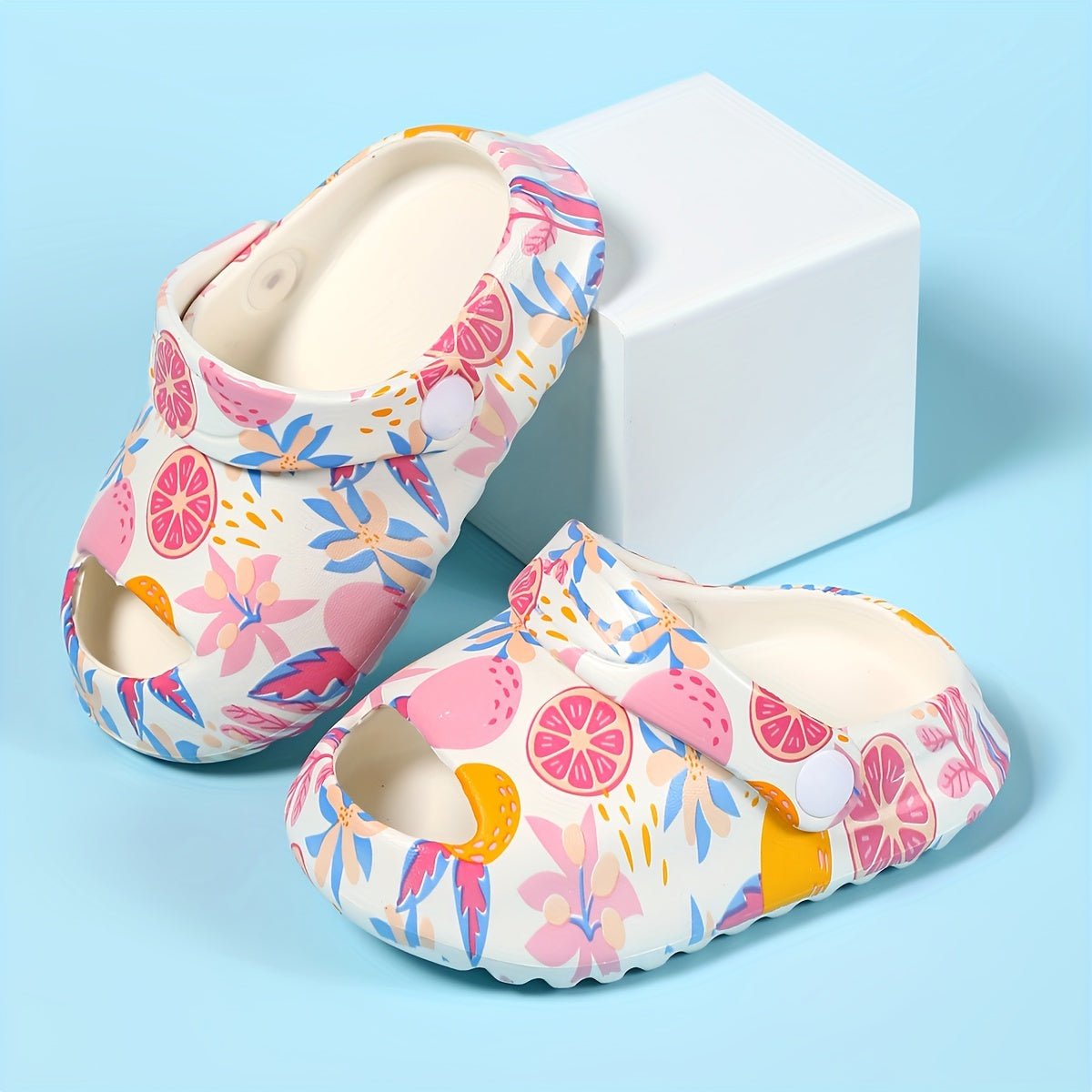 Stylish patterned clogs for girls, perfect for indoor and outdoor wear.