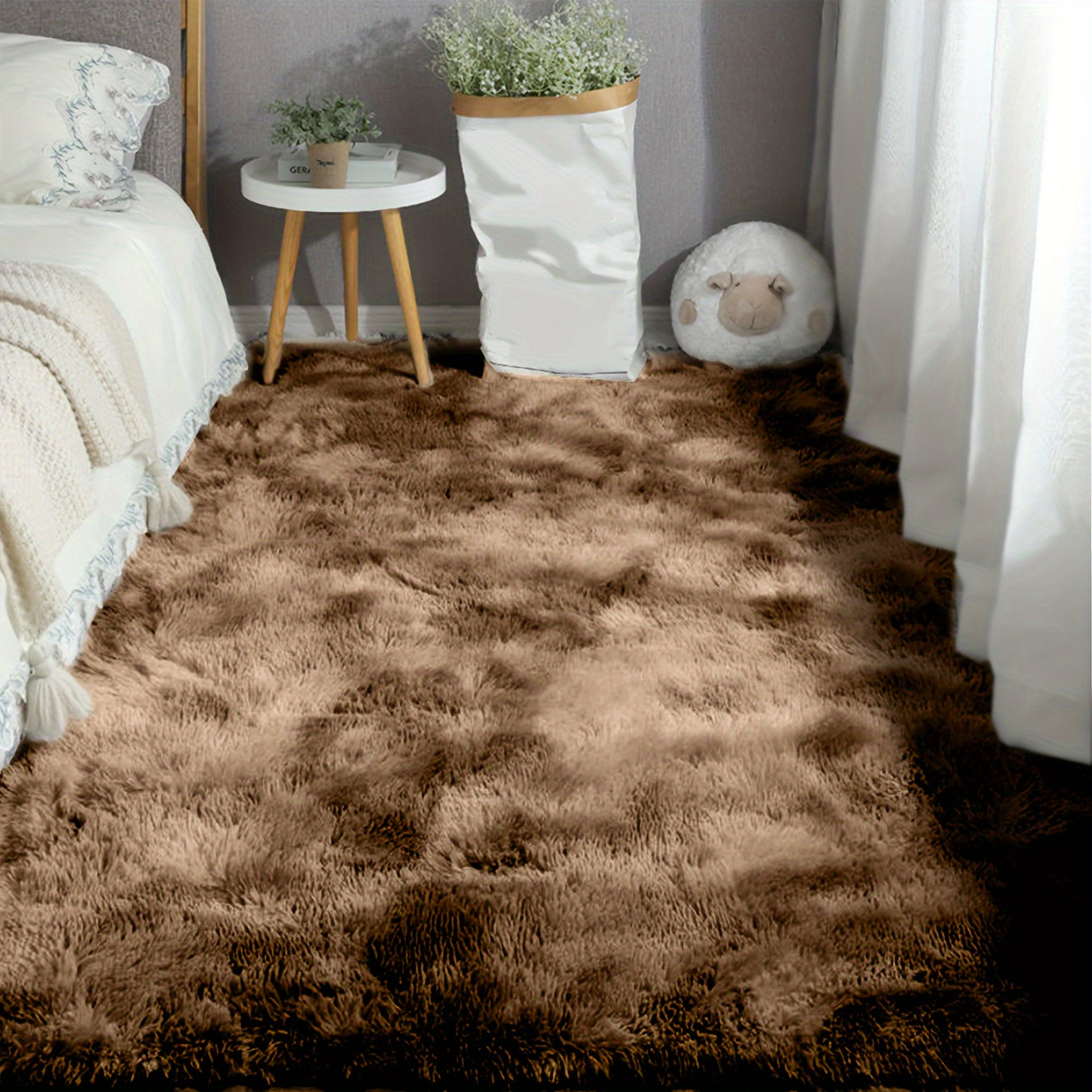 Soft fluffy shag area rug designed for living rooms and bedrooms. This cute luxury carpet is perfect for adding warmth and style to your home decor. The non-slip rug is also machine washable for easy maintenance. Ideal for adding a touch of comfort and