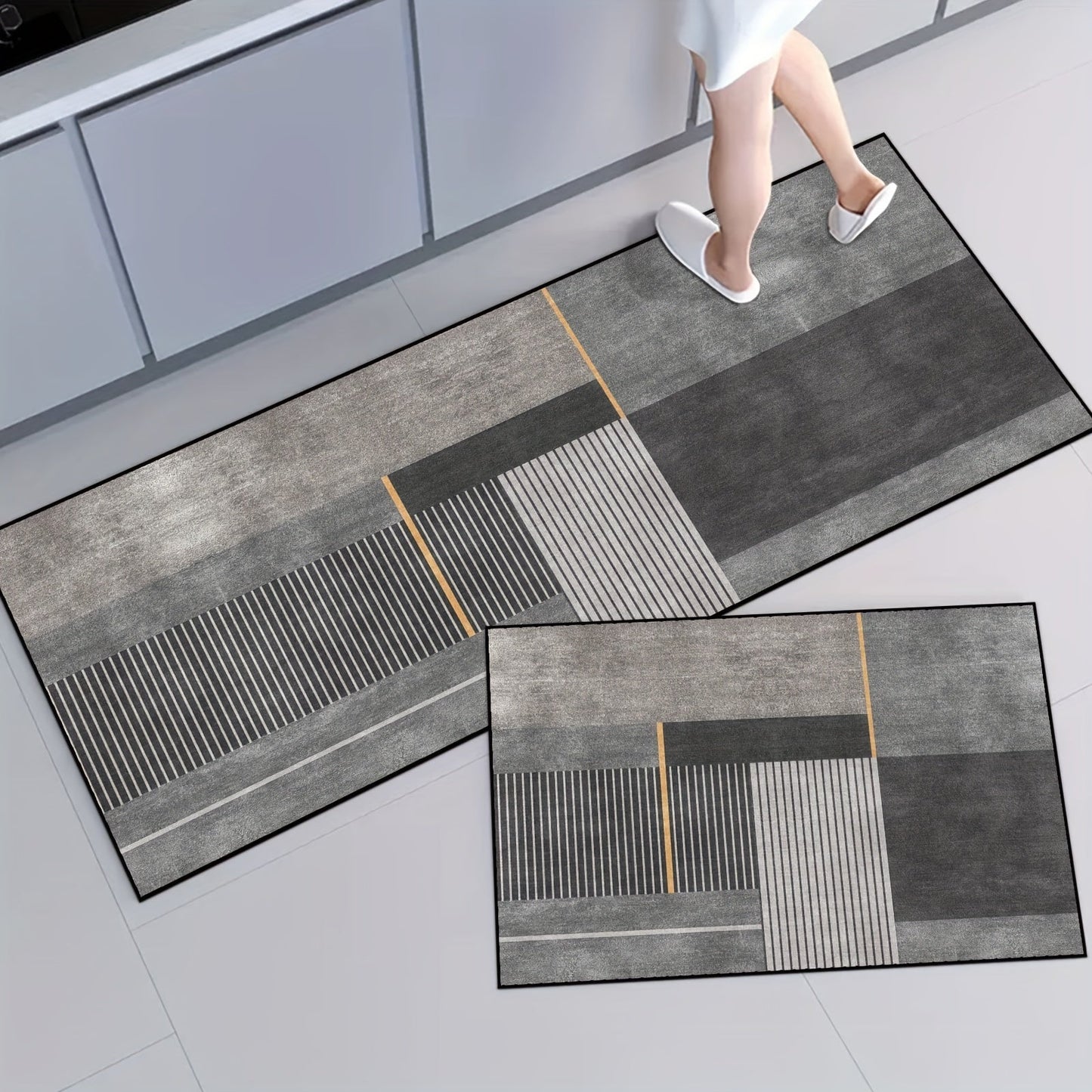 One piece of modern absorbent floor mat that is anti-fatigue and oil-proof, suitable for use in the kitchen. This non-slip kitchen rug is waterproof and can be used as a runner rug or standing desk mat. Perfect for use in the house, sink, office, or