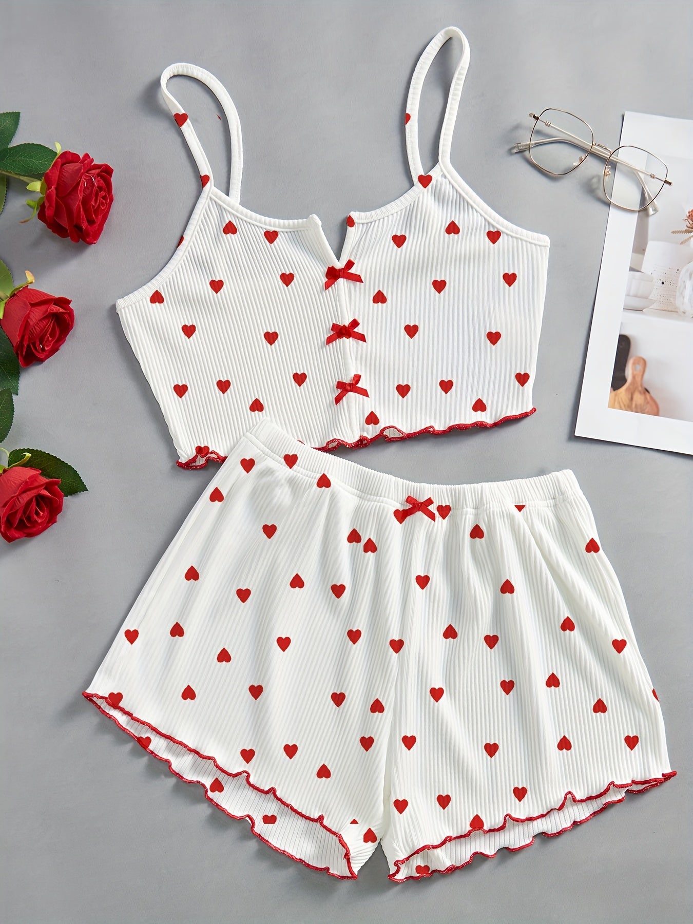 Valentine's Day heart print lounge set with lettuce trim, bow decor cami top, and elastic shorts for women's sleepwear.