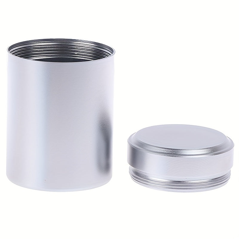 Compact and innovative, this tea packaging box is a portable canister crafted from titanium-aluminum alloy for durable and secure storage of tea leaves.