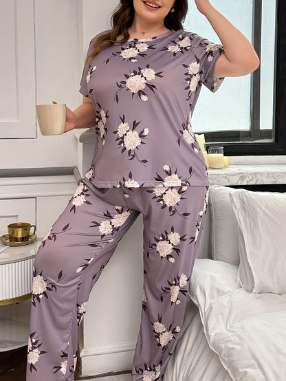 Plus size floral print pajama set for women, including short sleeve top and pants.